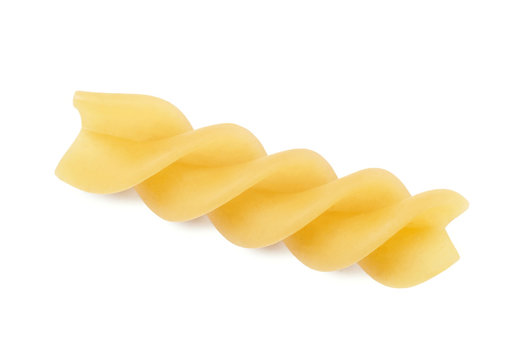 Raw italitan yellow pasta torti isolated on white background. Top view.