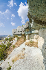 Fototapeta na wymiar A limestone cliff near the village of Pchelari, where the thracian tomb is located.
