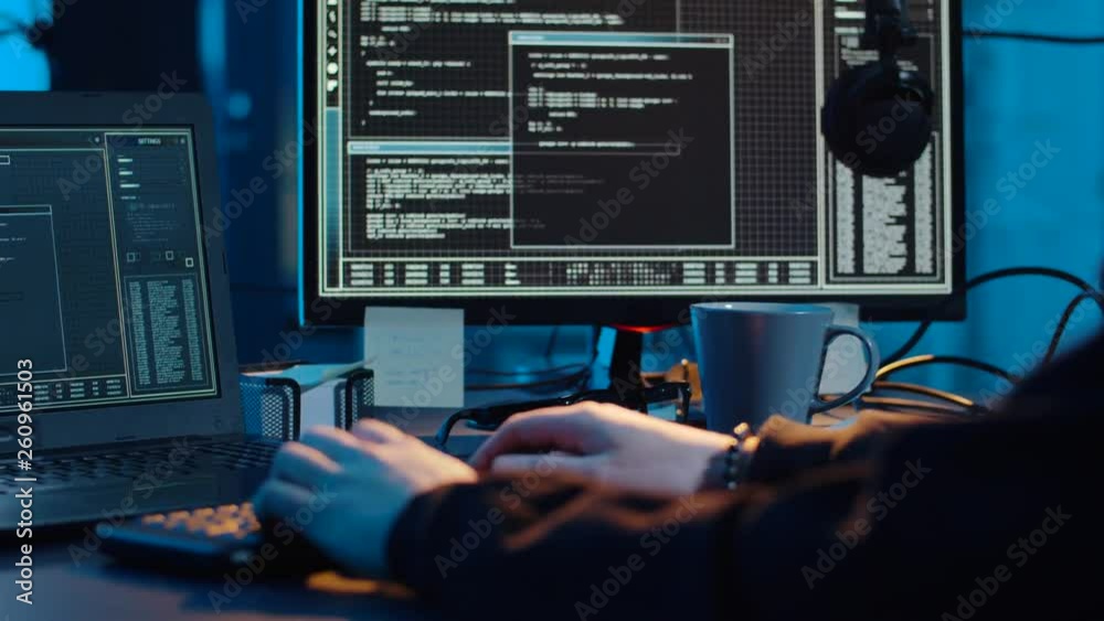 Poster cybercrime, hacking and technology concept - asian male hacker writing code or using computer virus 