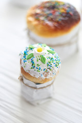 Easter cakes on a white wooden background