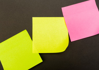 set of colour  paper stick note on a black background