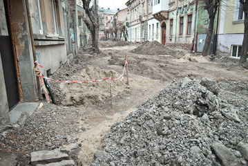 The street of the city is torn down. Construction and laying of pipelines and sewerage. Chernivtsi,...