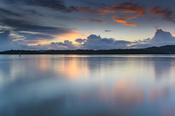 Fototapeta premium Early Morning Clouds and Reflections on the Bay
