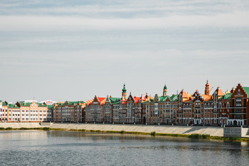 Fototapeta premium Yoshkar-Ola, Russia. Bruges Quay in the city of Yoshkar-Ola in Russian copy of the waterfront in the city of Bruges in Belgium