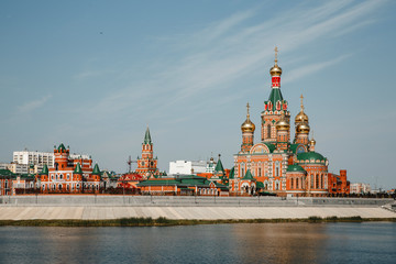 Fototapeta premium Yoshkar-Ola city, Republic of Mari El, Russia. View of the Blagoveshchenskaya Spasskaya Chirch on the square of Yoshkar-Ola city