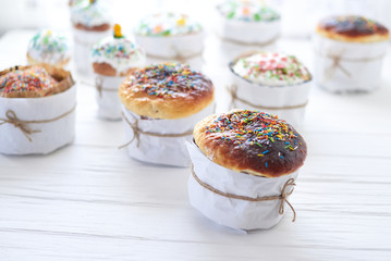 Easter cakes on a white wooden background