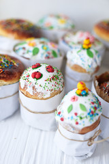 Easter cakes on a white wooden background