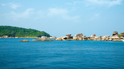 Stones and rocks paradise lagoon. Island in the ocean. Thailand. Andaman Sea. Seascape with azure...