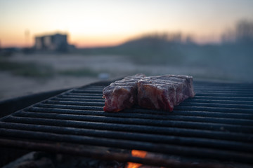 Beef steak on charcoal grill