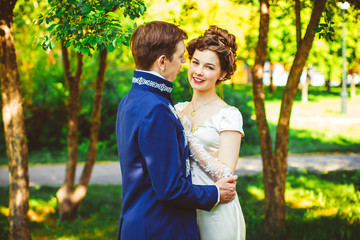 Fototapeta premium Beautiful couple in evening dress on the nature