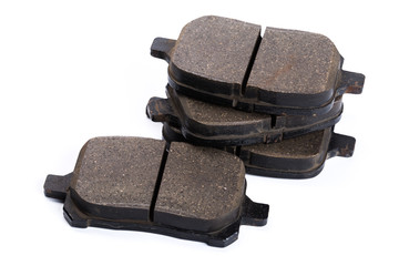 Set of brake pads, car spares isolated on white background