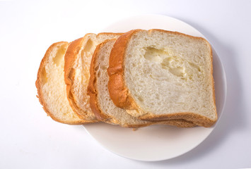 Slice of toasted bread on white background