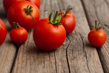 tomato variations on old wooden table