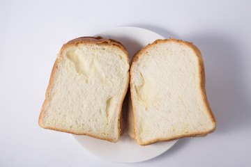 Slice of toasted bread on white background