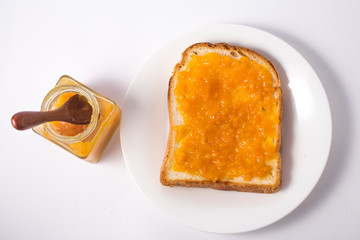 Slices of bread with orange jam