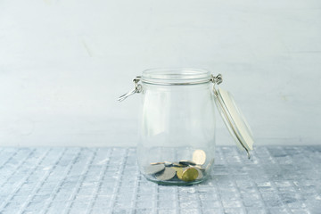 Saving jar with coins