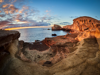 Rocky coast of San Miguel del Tajao of the southeast part of Tenerife at sunrise in the Spanish Canary Islands