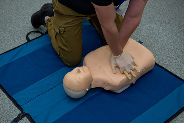 First aid cardiopulmonary resuscitation course using automated external defibrillator device, AED.