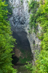 The Macocha Gorge with lake, sinkhole in the Moravian Karst cave system, Czech Republic, Europe.