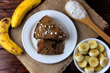 Healthy homemade banana cake made with oatmeal on rustic wooden table. sugar-free, milk-free, gluten-free