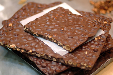Slices of chocolate with hazelnut.