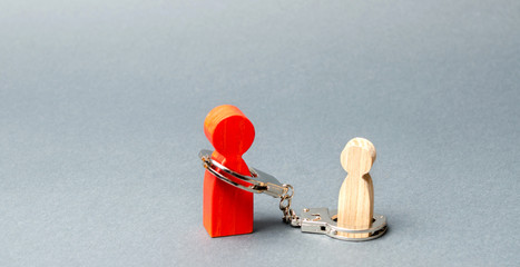 The parent is handcuffed to the child. The concept of parental debt. Alimony payment. Custody, care...