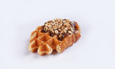 waffle with chocolate nut cream on a white background