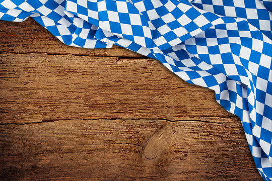 old rustic retro wood wooden texture with bavarian flag dark brown vintage weathered Oktoberfest background