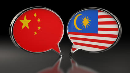 China and Malaysia flags with Speech Bubbles. 3D Illustration