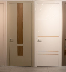 two house room doors for sale at furniture store showroom