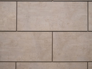 abstract pattern wall made of grey concrete blocks