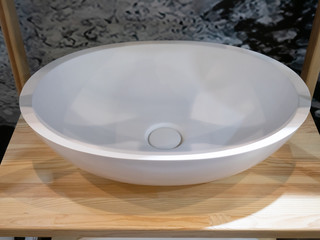 modern ellipse white ceramic or white stone washbasin
