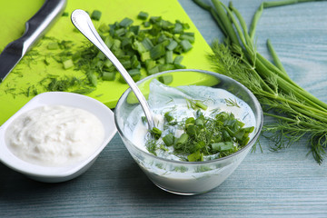 Salad with yogurt and green vegetables. Dip with soy yogurt, green onion and dill. 