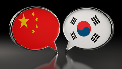 China and South Korea flags with Speech Bubbles. 3D Illustration