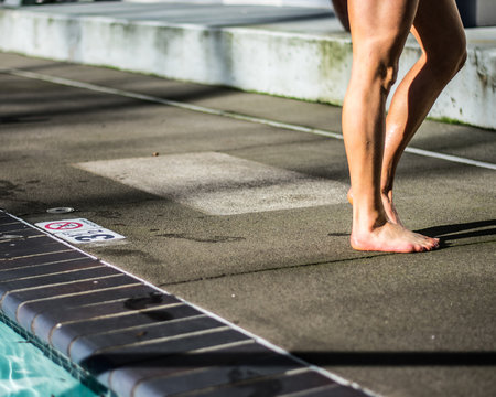 Girl Drying Off By The Pool