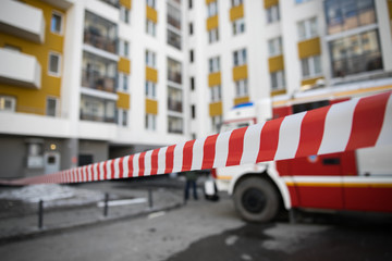 Naklejka premium Red and white hazard tape on red and white cones