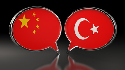 China and Turkey flags with Speech Bubbles. 3D Illustration