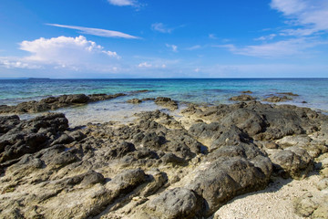 coastline  with rocks  and beautiful reef in raja ampat archipelago
