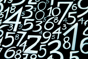 Background of numbers. from zero to nine. Numbers texture. Currency symbols. Numerology. Mathematical equations and formulas