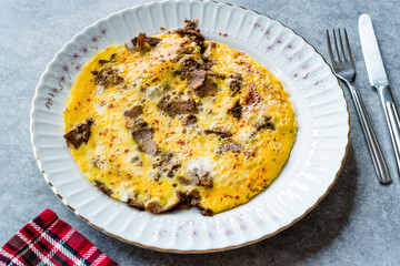 Omelette with Meat Kavurma for Turkish Breakfast.