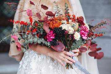 Beautiful wedding bouquet in the bride's hands