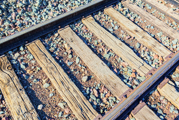 Old railway sleepers and rails in an American town.