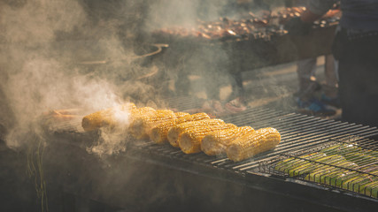 corn on the cob. grilled corn. Cooking Grilled Corn. street food