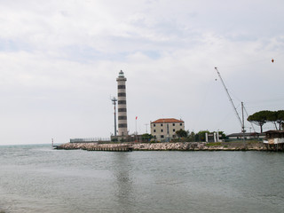 Fototapeta na wymiar Jesolo lightouse for access to the port