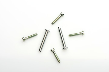 small bolts on a white background. the bolts