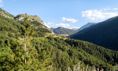 Fototapeta na wymiar pass road and surrounding mountains