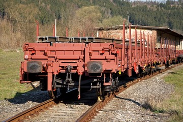 Construction of railway tracks. Railway infrastructure. Railroad car loaded with rails. Rails on a wagon ready for track construction.