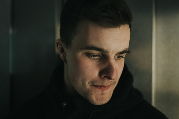 Close up portrait of young female. Moody scenery.