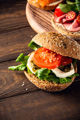 Italian Caprese sandwiches with fresh tomatoes, mozzarella cheese