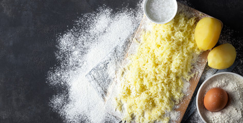 Grated boiled potatoes with flour, egg and salt for the preparation of an Italian dish - potato...